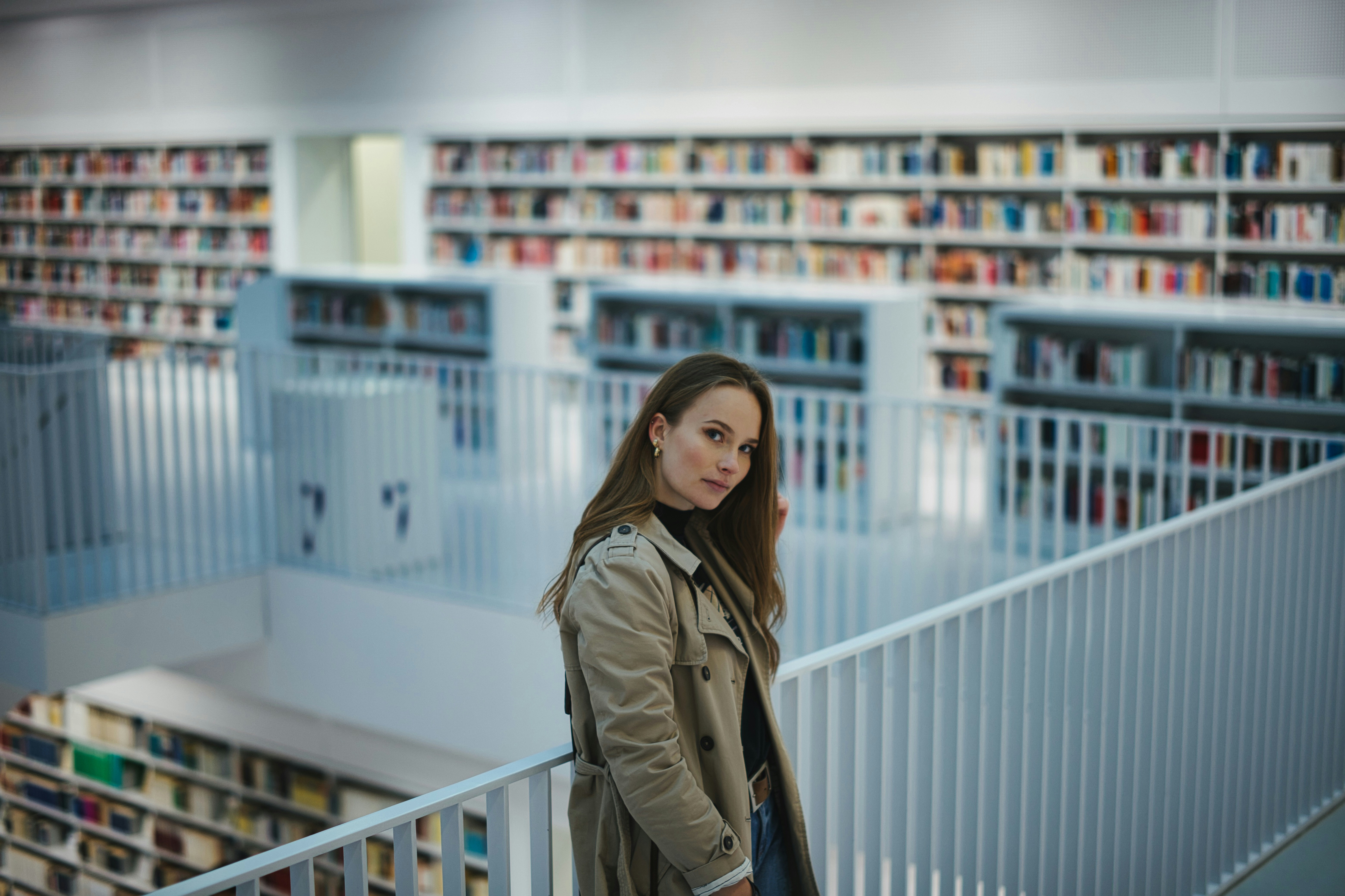 Woman in library of how to start a nonprofit resources.
